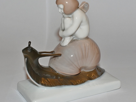 šnek a putto, A. Caasmann, Rosenthal